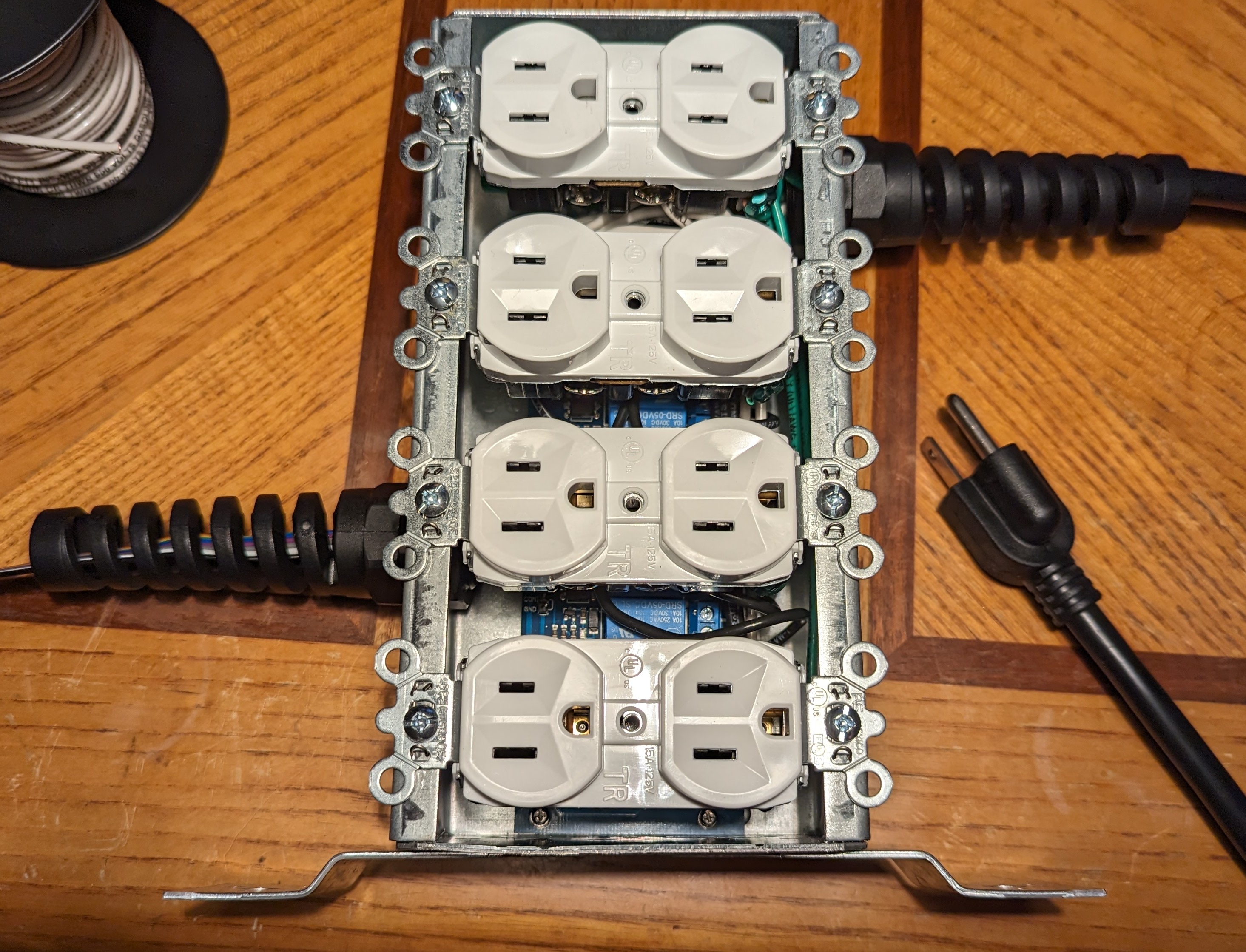 Relay switched outlet box